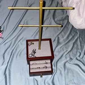 Jewelry stand with ring and bracelet space